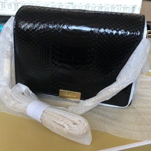 MD Gusset Clutch G.snake skin